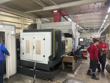 CNC machining centers and machinists in the Bigtem machine shop